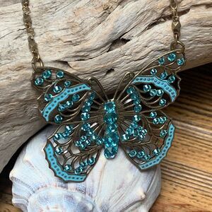 Blue Filigree Butterfly Necklace with Vintage Appeal NWOT